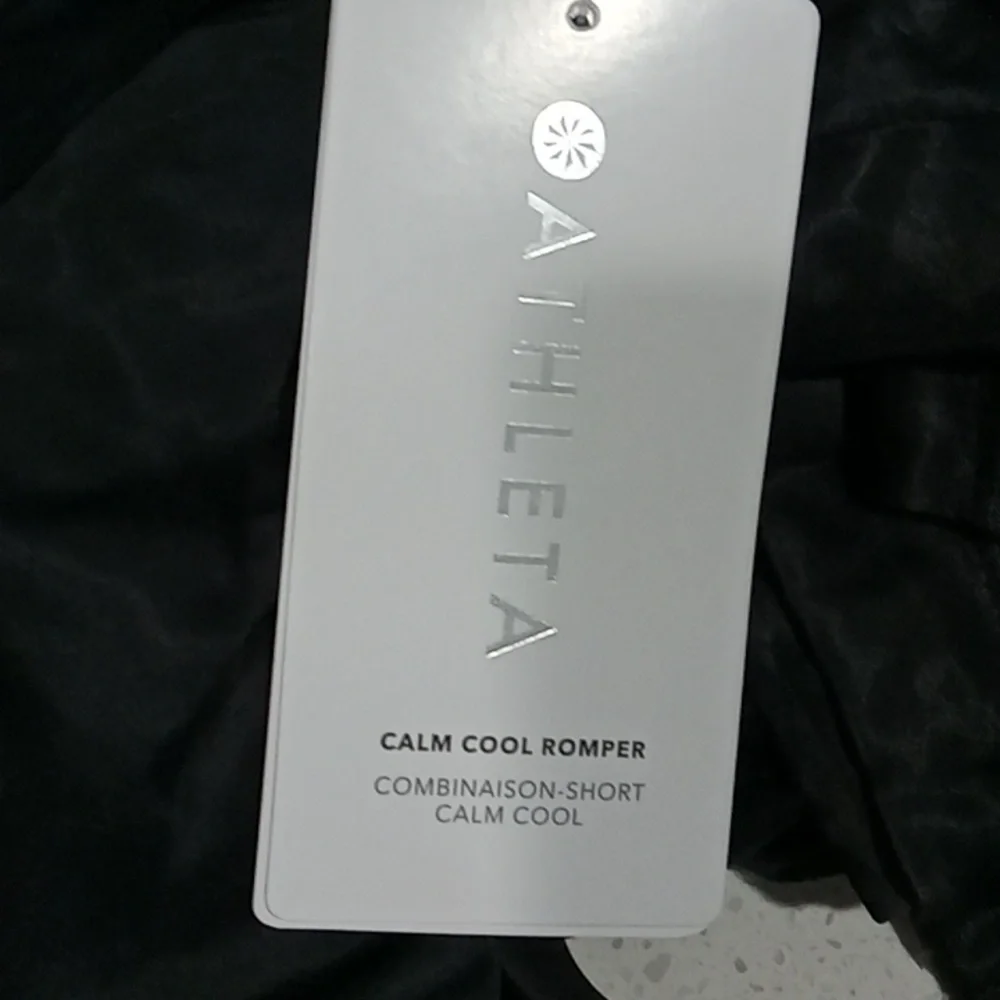 Athleta black Calm Cool Romper. Super soft satin feel. 28" inseam Size XS NWT - Picture 6 of 6
